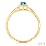 5x3 MM Pear Shape Blue Topaz and 1/20 ctw Single Cut Diamond Halo Semi Precious Ring in 14K Yellow Gold