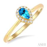 5x3 MM Pear Shape Blue Topaz and 1/20 Ctw Single Cut Diamond Halo Semi-Precious Ring in 10K Yellow Gold