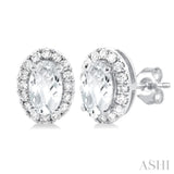 5x3 MM Oval Shape White Topaz and 1/8 Ctw Single Cut Diamond Halo Semi-Precious Stud Earrings in 10K White Gold