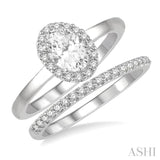 3/8 Ctw Round Cut Diamond Wedding Set With 1/3 Ct Halo 1/4 Ct Oval Cut Center Stone Engagement Ring and 1/10 Ct Wedding Band in 14K White Gold