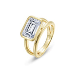Floating Emerald Split Shank Ring