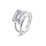 Floating Emerald Split Shank Ring