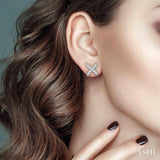 1/10 Ctw 'XO' Hugs and Kisses Petite Round Cut Diamond Earrings in 10K White Gold