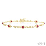 4X3 MM Pear Cut Ruby and 1/20 Ctw Round Cut Diamond Precious Fashion Bracelet in 10K Yellow Gold