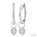 1/3 Ctw Bezel Set Oval Cut Diamond Huggie Earrings in 14K White Gold