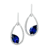 14K white gold earrings featuring 10x6mm flame cut Chatham lab grown sapphire with Chatham lab grown diamond accents.