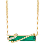 14K yellow gold bar necklace featuring an elongated baguette Chatham lab grown emerald with Chatham lab grown diamond accents.