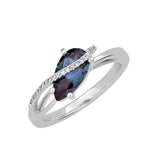 14K white gold ring featuring a 10x5.5mm pear-cut Chatham lab grown alexandrite with Chatham lab grown diamond accents.