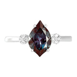 14K white gold ring featuring an 11x7mm flame-cut Chatham lab grown alexandrite and Chatham lab grown diamond accents.